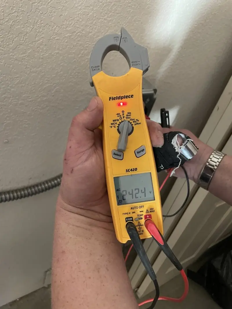 Voltage testing with clamp meter during Circuit Breaker Repair in Fircrest